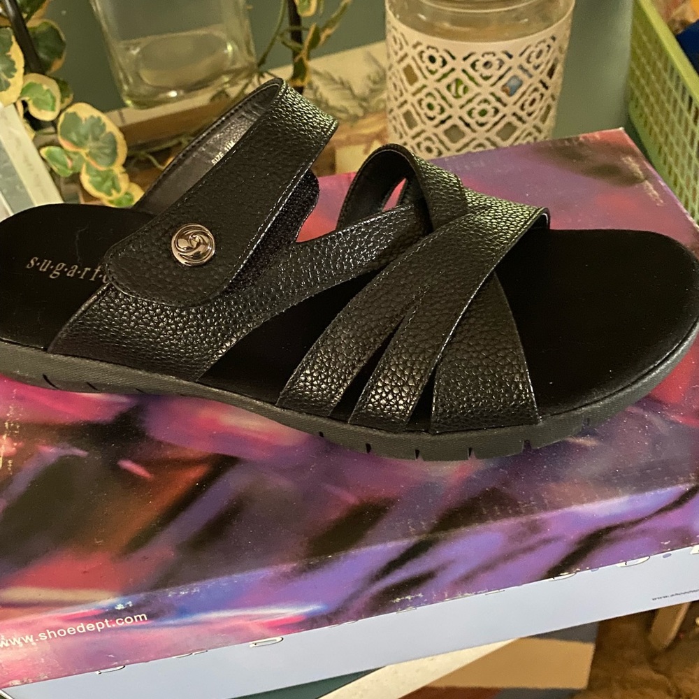 Beautiful pair of new sandals . New w/o tags but in box with all wrappings